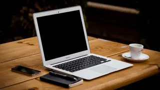 Laptop on a wooden desk