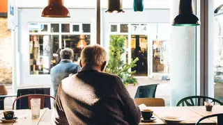People working in a café